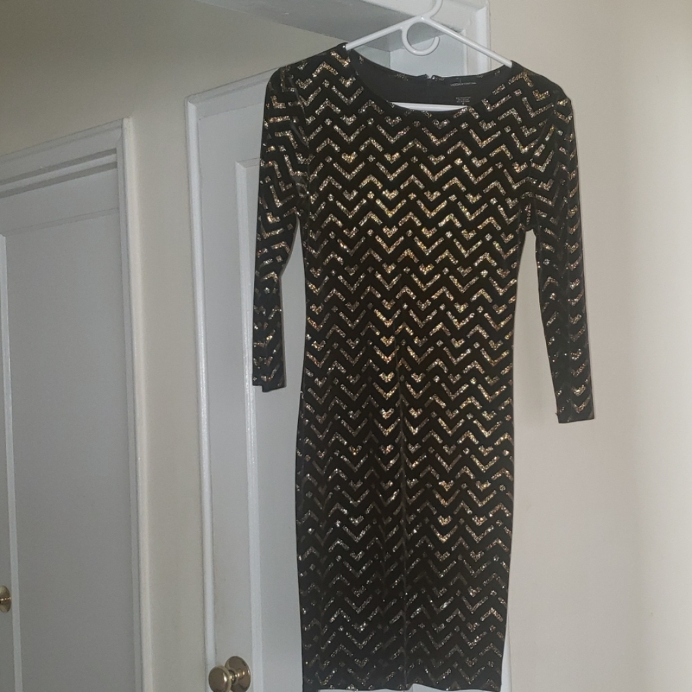 Moda International dress. Zips in the back